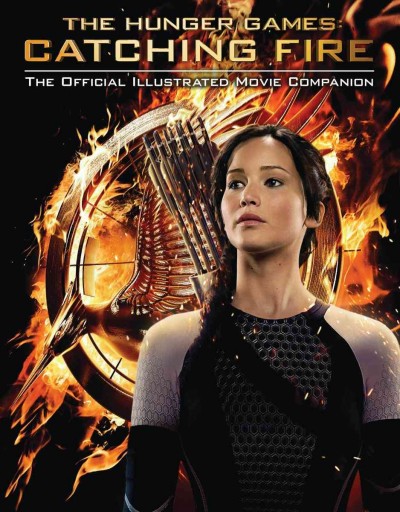 The hunger games: catching fire : the official illustrated movie companion / by Kate Egan.